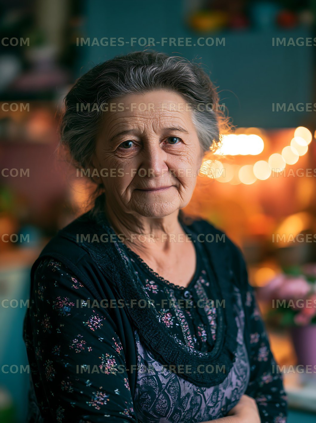 Elderly woman with gray hair standing in a cozy interior