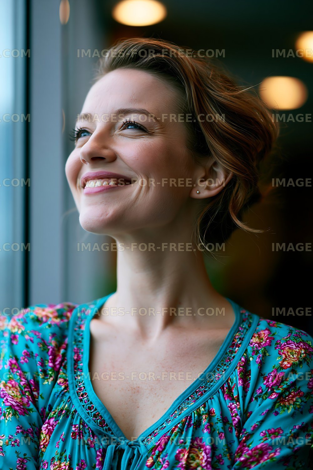 Woman smiling by window with soft lighting