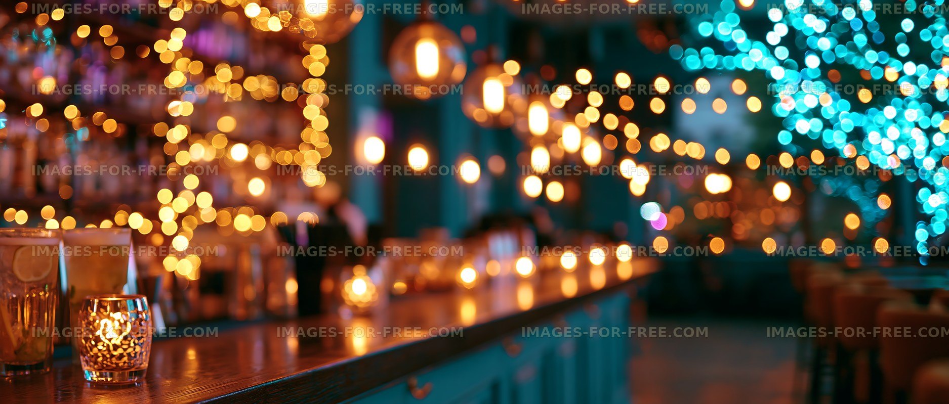Warm lights illuminate a cozy bar setting at night