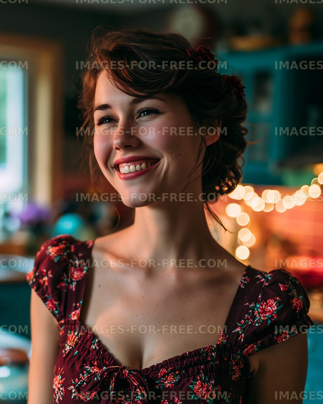 Smiling woman in a dimly lit kitchen with decorative lights