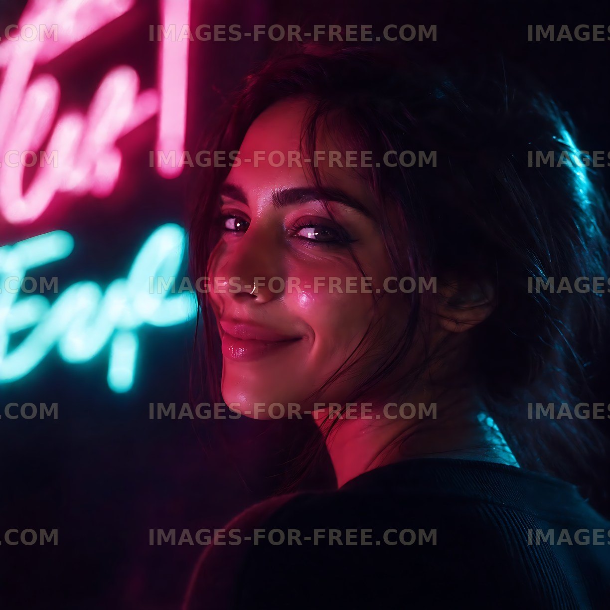 Woman smiling near neon signs at night
