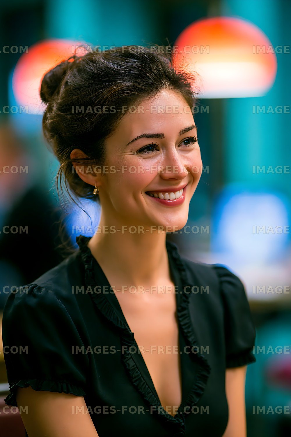 Woman smiling in a restaurant with colorful lights in background
