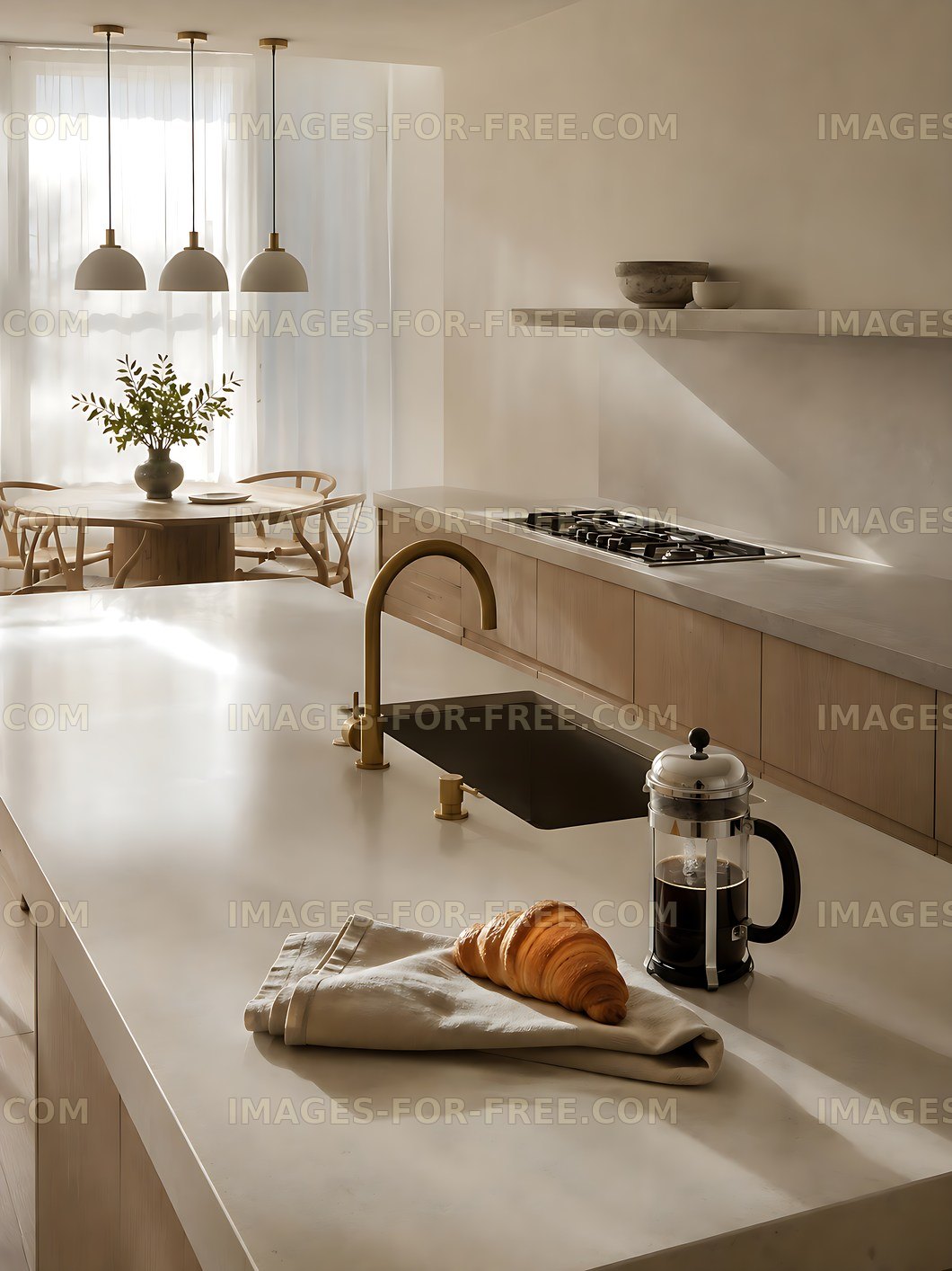 Modern kitchen with coffee and croissants on the countertop