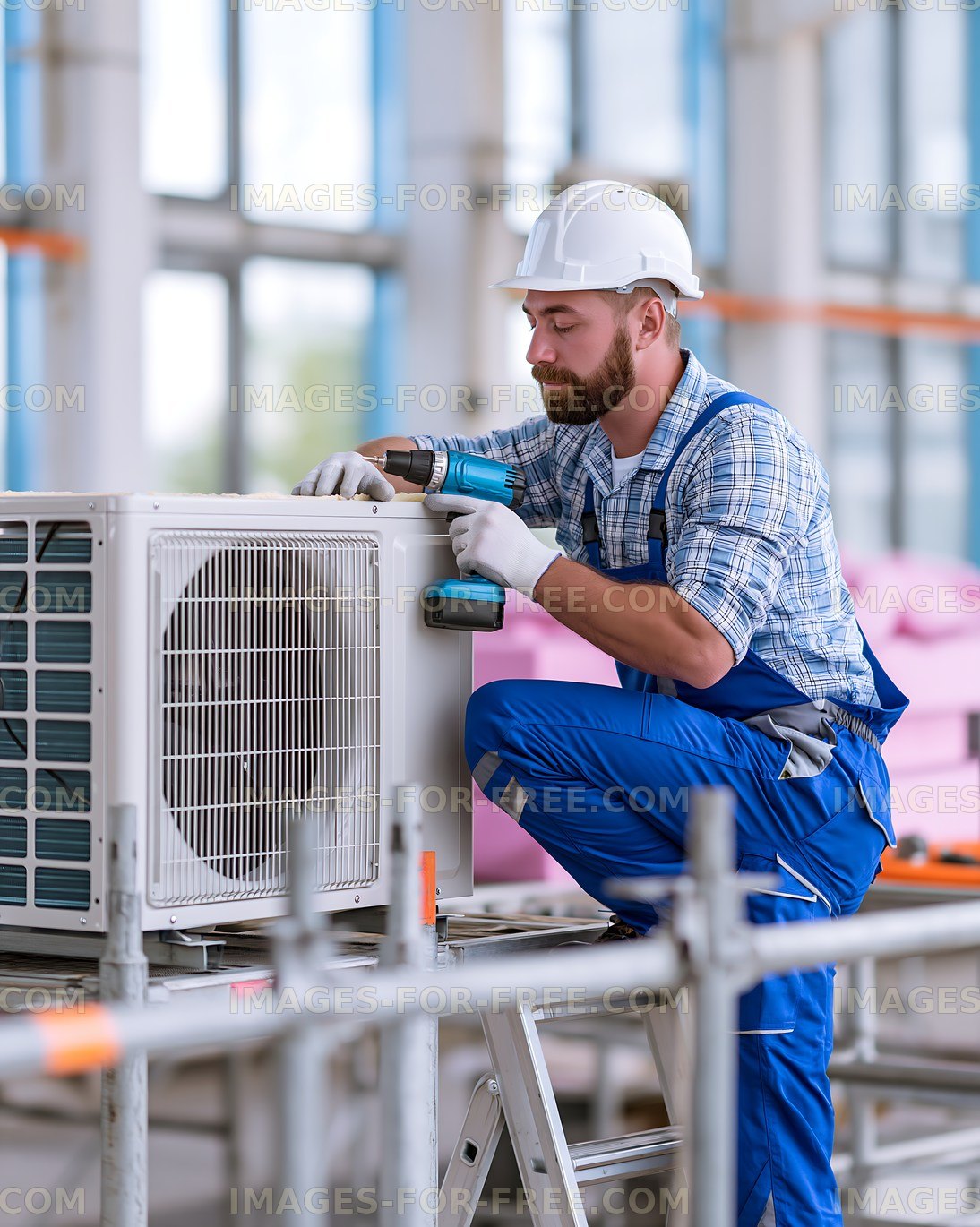 Technician installing air conditioning unit in modern building