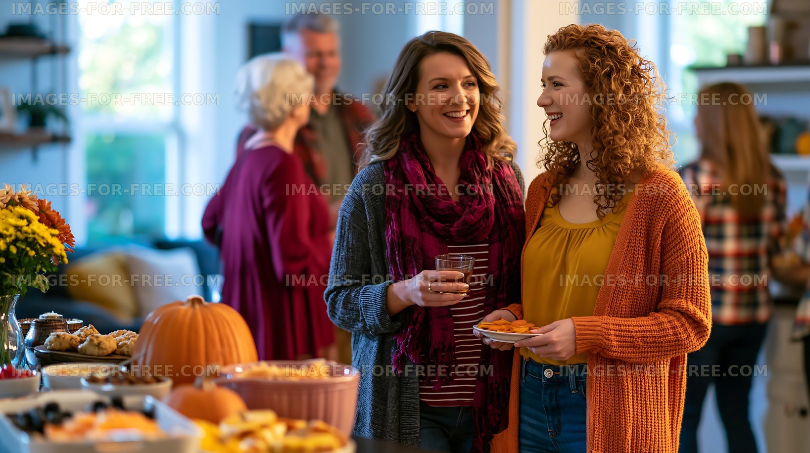 Friends enjoying food and drinks at a festive gathering