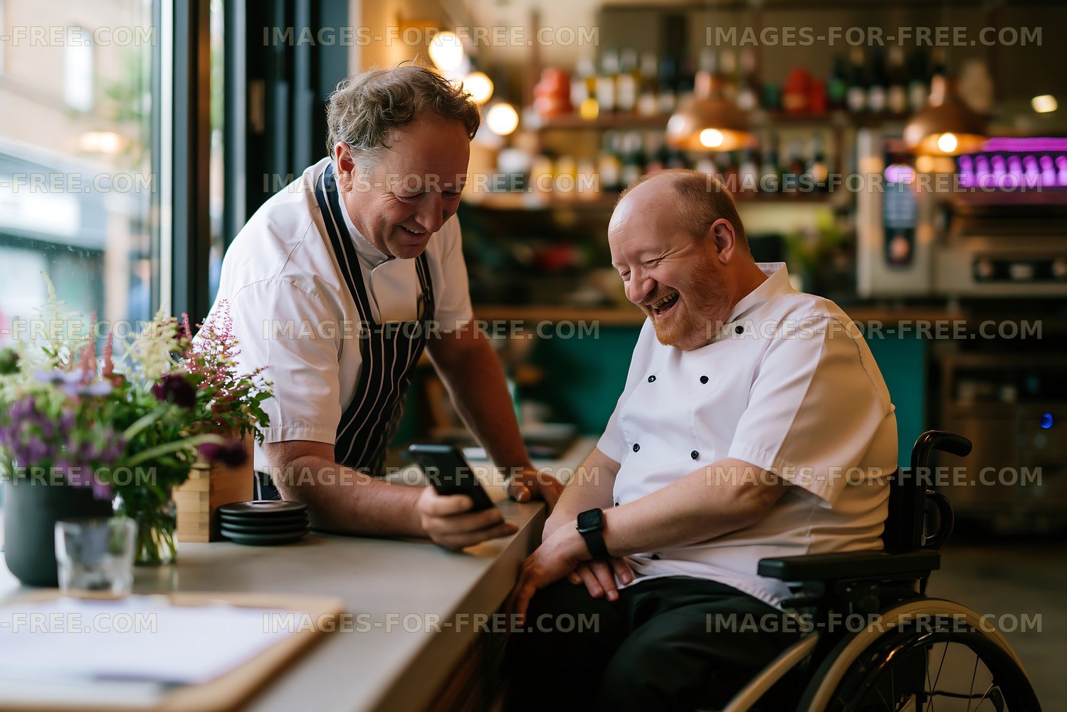 Chefs sharing a moment in a restaurant kitchen