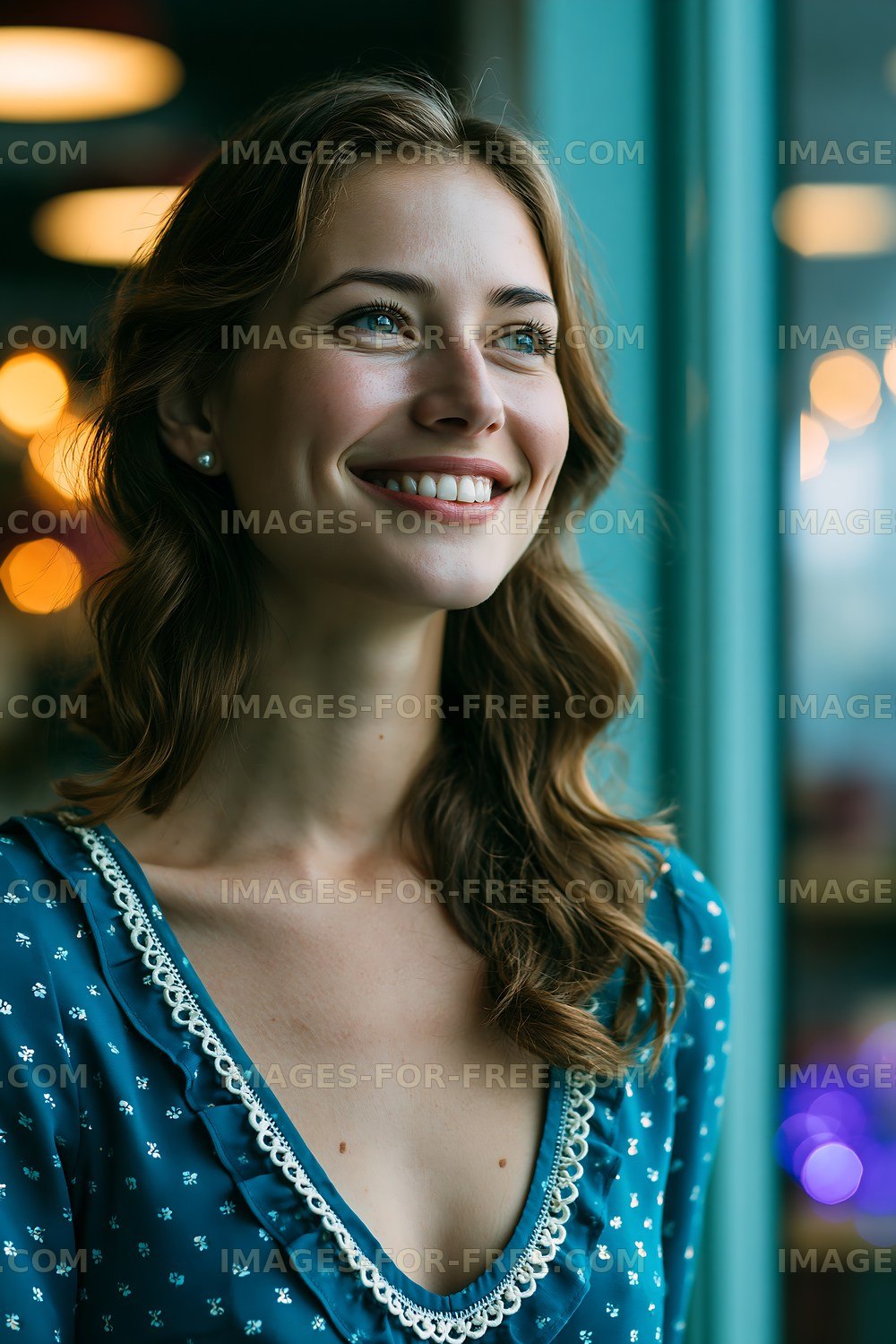 Woman smiling by window with soft lighting in a cafe