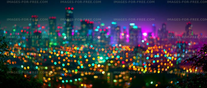 Colorful city skyline at night with bright lights