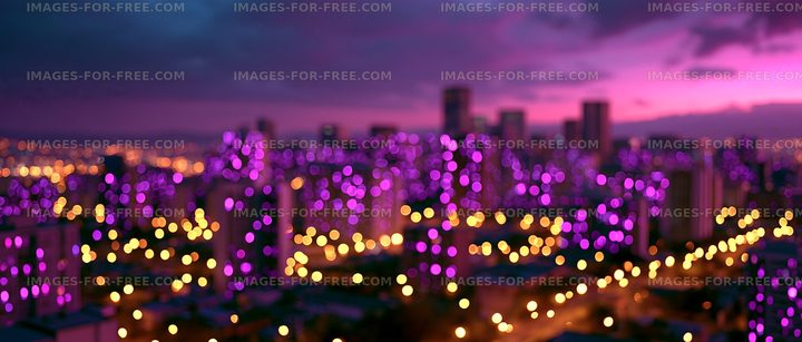 City skyline with purple lights at dusk