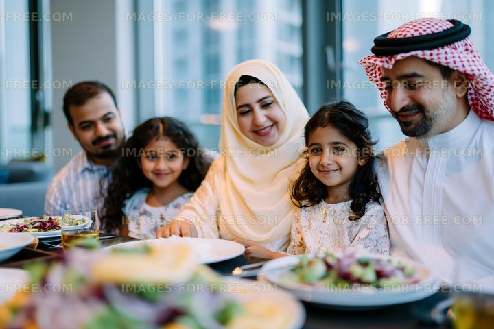 Family enjoying a meal together in a modern dining setting