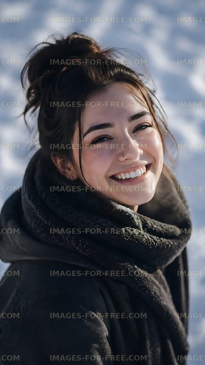 Woman smiling in snowy landscape