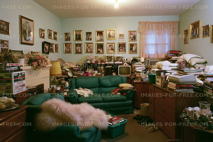 Cluttered living room filled with old photographs and items