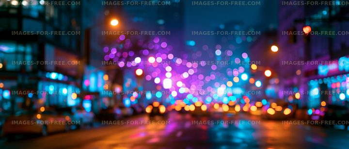 City street at night with colorful lights and blurred effects